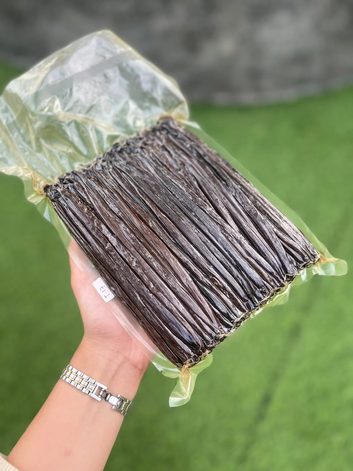 Tahitian vanilla beans held in vacuum packaging